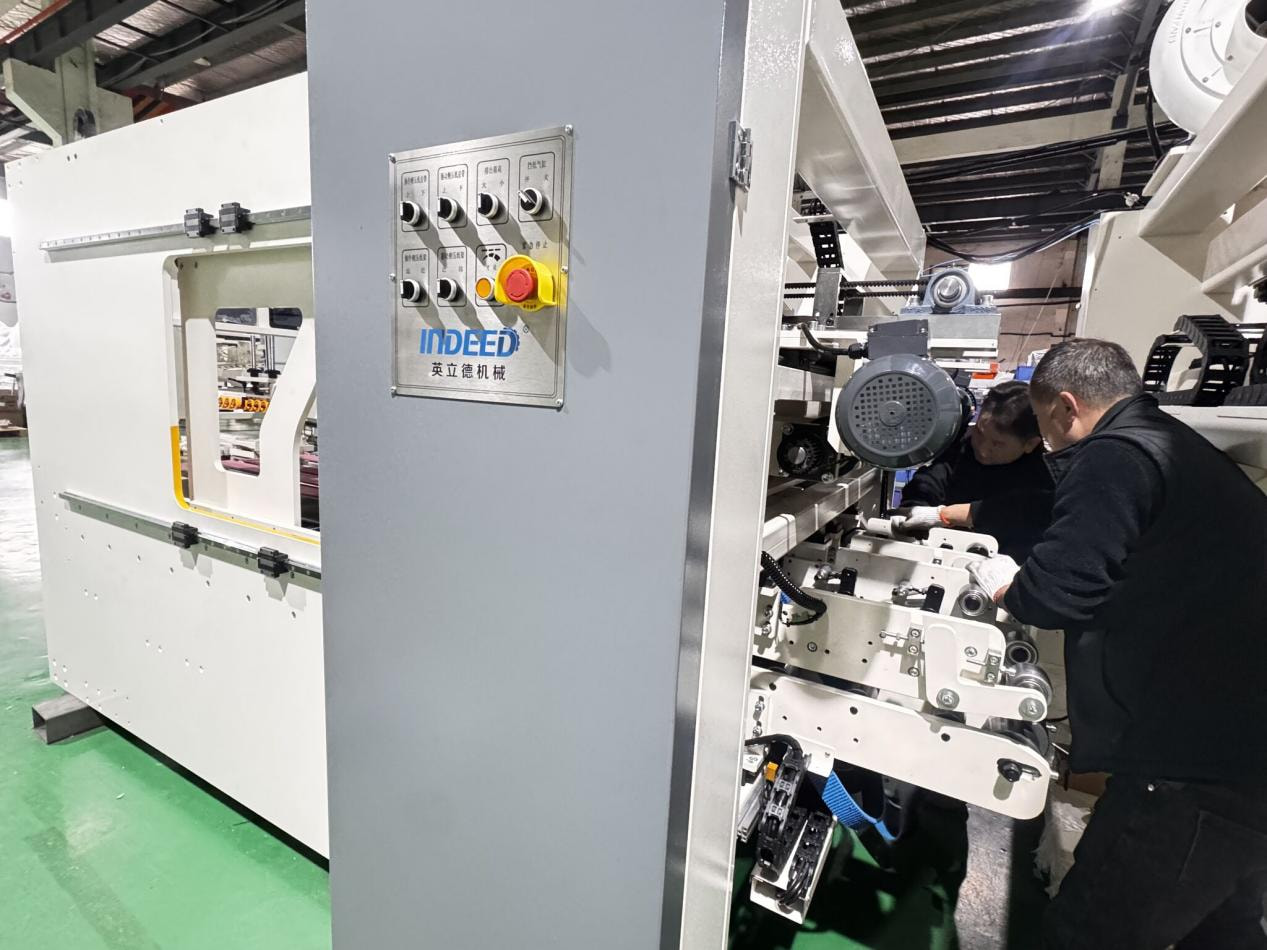 kunshan indeed machinery engineer on site installation box gluing machine